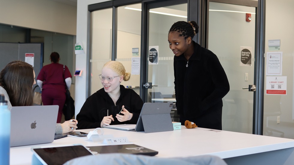 PPSD students work together on campus in the dedicated study space provided for scholars in the Brown Collegiate Scholars Program. 